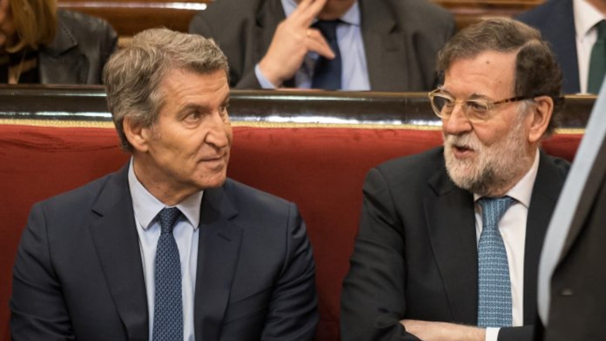 De gauche à droite: le leader du Parti Populaire espagnol Alberto Núñez Feijóo et Mariano Rajoy, ancien chef du gouvernement issu de la même formation politique.